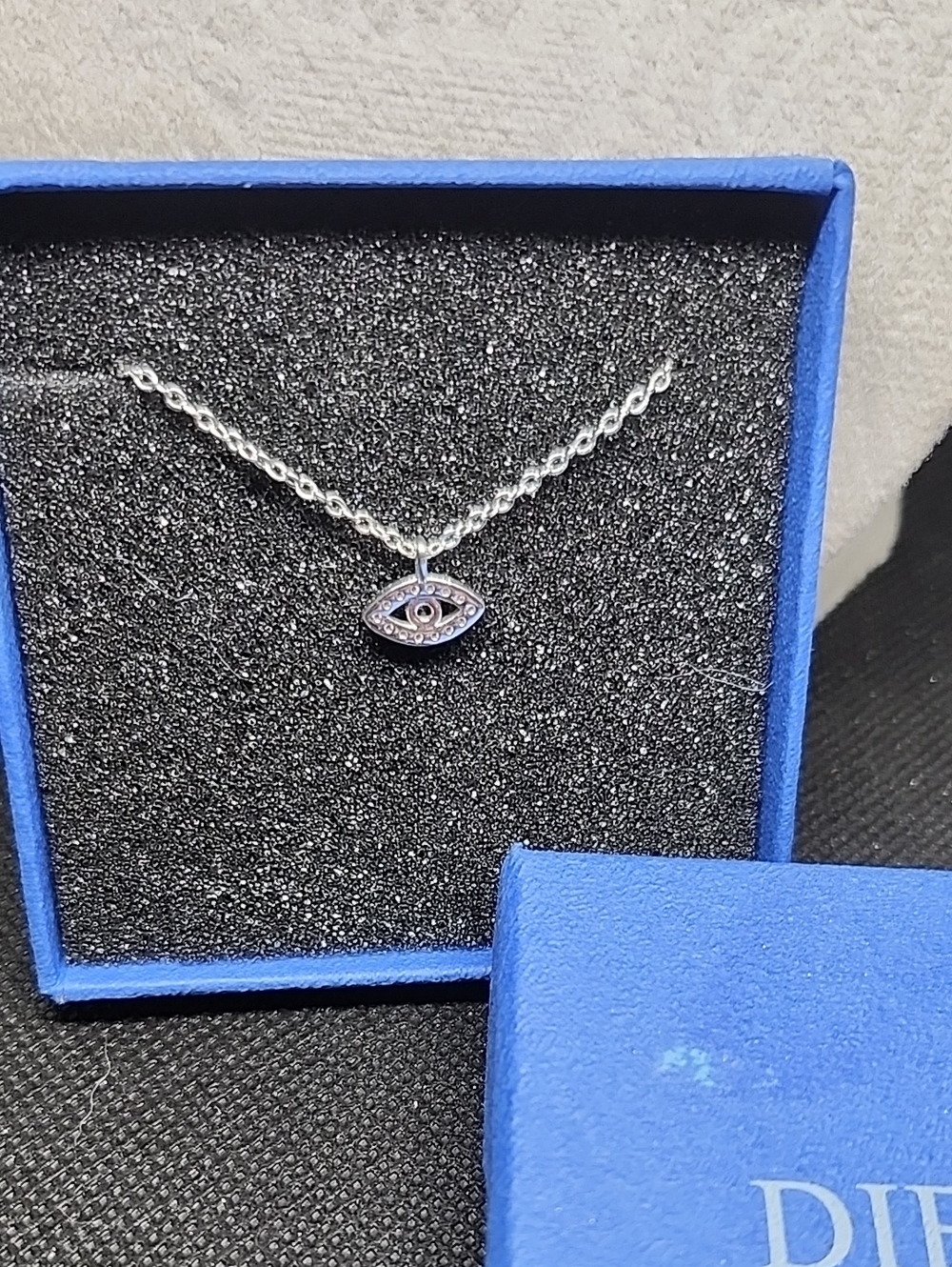 Silver Evil Eye Necklace with Blue Accent